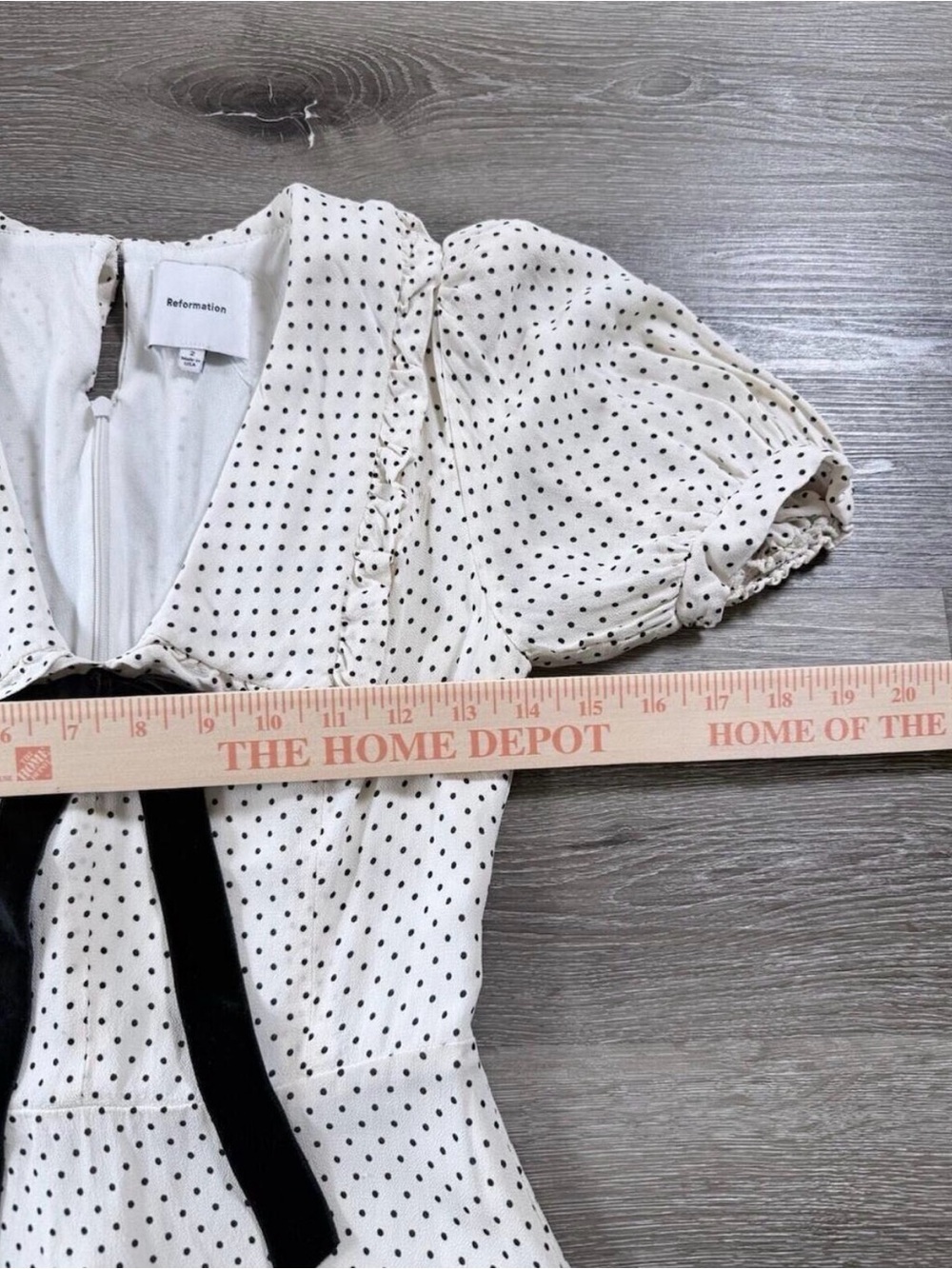 Reformation Kaylia Polka Dot Mini Dress in cream with a black bow - Picture 5 of 9